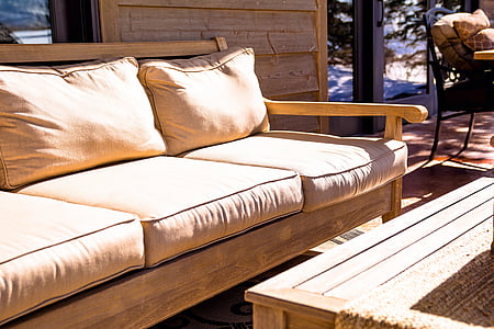 brown wooden framed fabric padded sofa during daytime thumbnail