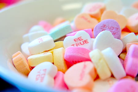candies inside white bowl thumbnail
