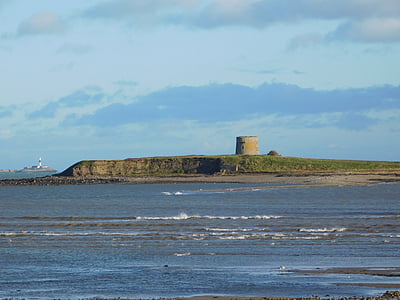gray concrete structure on island thumbnail