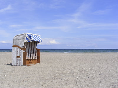 blue and brown wooden stall near body of water thumbnail