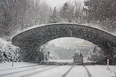 Photo of White Vehicle Crossing a Tunnel thumbnail
