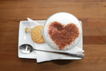 coffee and biscuit on white ceramic plate thumbnail