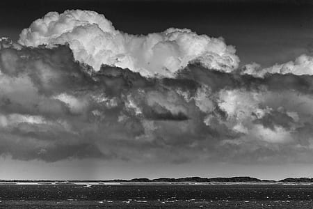 grayscale photo of clouds during daytime thumbnail