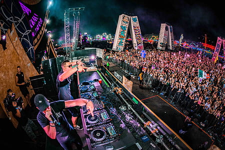 group of people in front of concern stage thumbnail