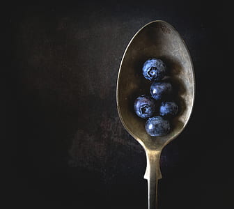 flat lay photography of blueberries on spoon thumbnail