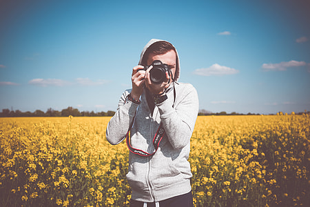 Photographer Taking a Photo in The Field thumbnail