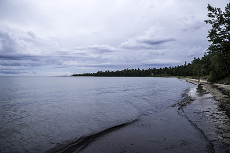 Shoreline of Lake Michigan under clouds at Newport State Park, Wisconsin thumbnail