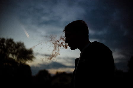 silhouette of man smoking thumbnail