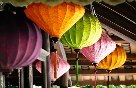 close-up photo of paper lanterns hanged on ceiling thumbnail