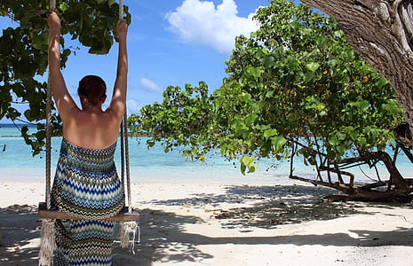 woman sitting on swing thumbnail