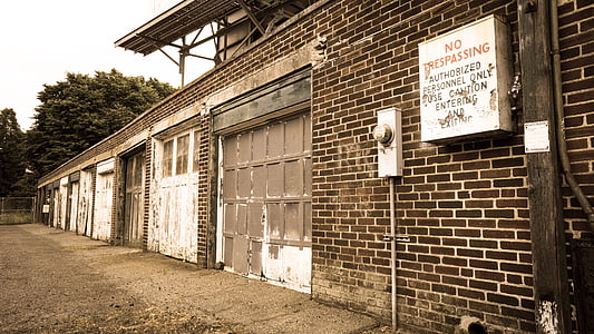 abandoned warehouse near trees thumbnail