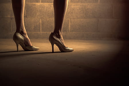 woman in silver pointed-toe heeled shoes thumbnail
