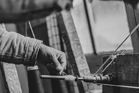 person holding thread thumbnail