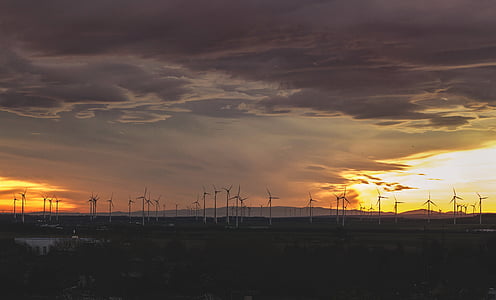 windmills during cloudy day thumbnail