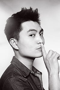 man showing silent sign thumbnail