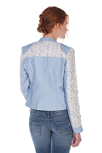 woman in white and blue floral dress shirt and blue jeans thumbnail