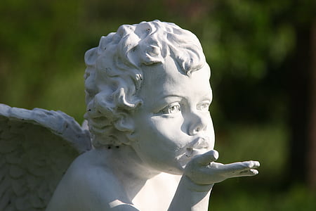 cherub doing flying kiss statue thumbnail