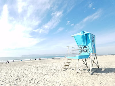 blue 3C guardhouse on seashore at daytime thumbnail