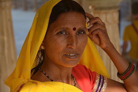 closeup photo of woman holding her head thumbnail