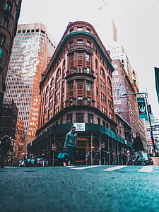 man walking front of Flatiron building thumbnail