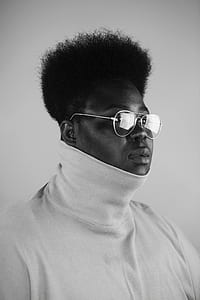 woman wearing eyeglasses greyscale photo thumbnail