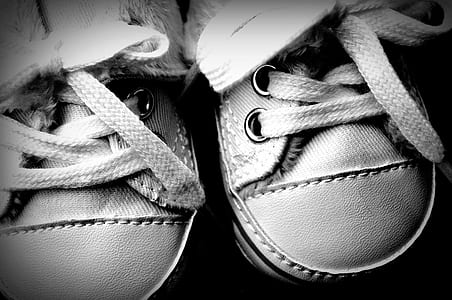 pair of gray shoes on black surface thumbnail