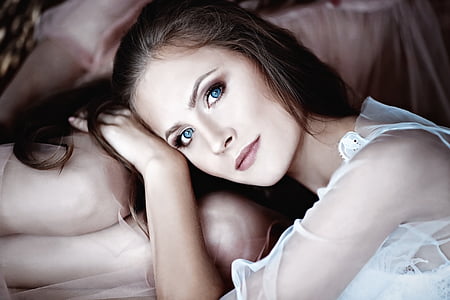photo of woman leaning on chair thumbnail