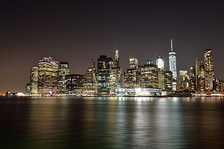 lighted concrete building during nighttime thumbnail