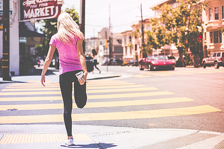 Fit Young Girl Stretching Her Legs Before Jogging Workout thumbnail