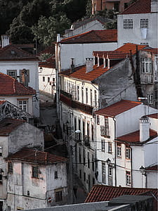 White and Brown Concrete Houses thumbnail