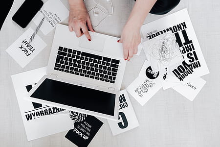 Femine Workplace with White Laptop thumbnail