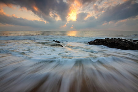 time lapse photo of sea waves during daytime thumbnail