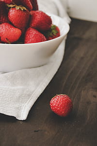 Red Strawberries on White Ceramic Bowl thumbnail