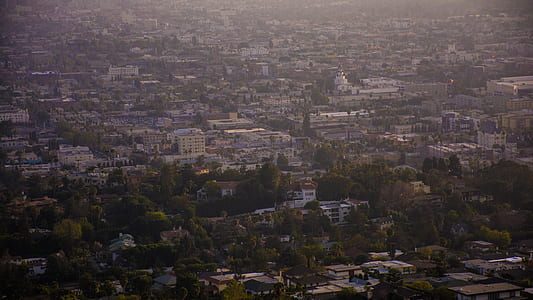 aerial photo of city houses and buildings during daytime thumbnail