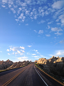 concrete road between mountain thumbnail