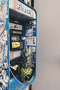 white, blue, and black telephone booth thumbnail