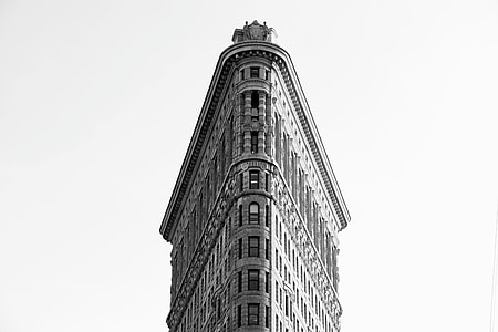 grayscale photography of triangular building in white background thumbnail