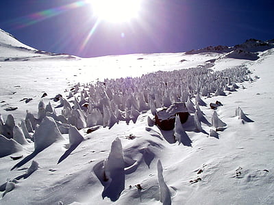 snow covered mountain during daytime thumbnail