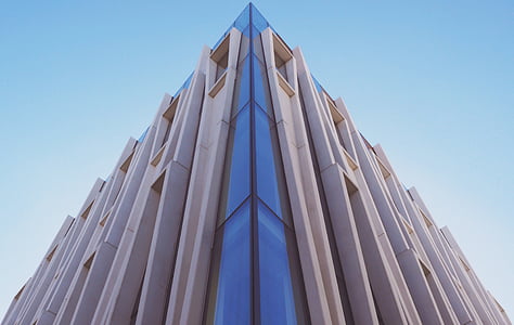 worm's eye view of white and blue building thumbnail