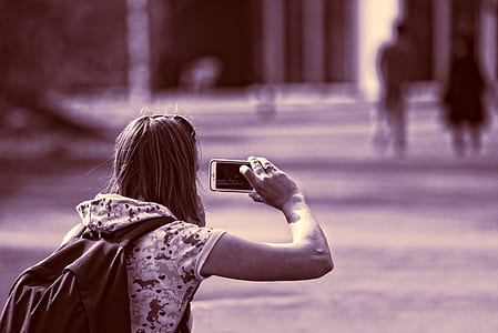 woman taking photo on two person thumbnail