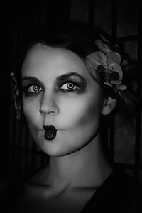 grayscale photo of woman wearing flower headband thumbnail