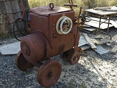 brown machine near grass thumbnail