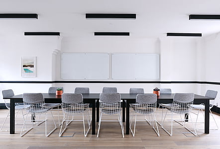 rectangular gray conference table inside the office thumbnail