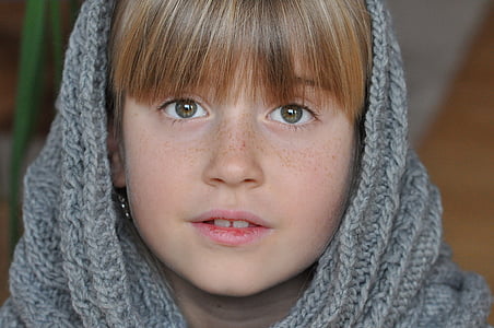 close-up photo of girl wearing gray cable knit hijab veil thumbnail