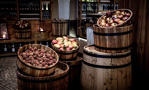 assorted fruits on wooden containers thumbnail