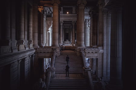 two person standing on staircase inside temple thumbnail