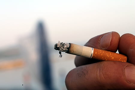 person holding a cigarette thumbnail