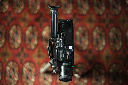 selective focus photography of black Sony camcorder thumbnail