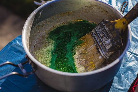 Yellow Paint Brush on Gray Steel Bucket thumbnail