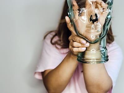 Woman's Hand Inside Glass Bottle thumbnail